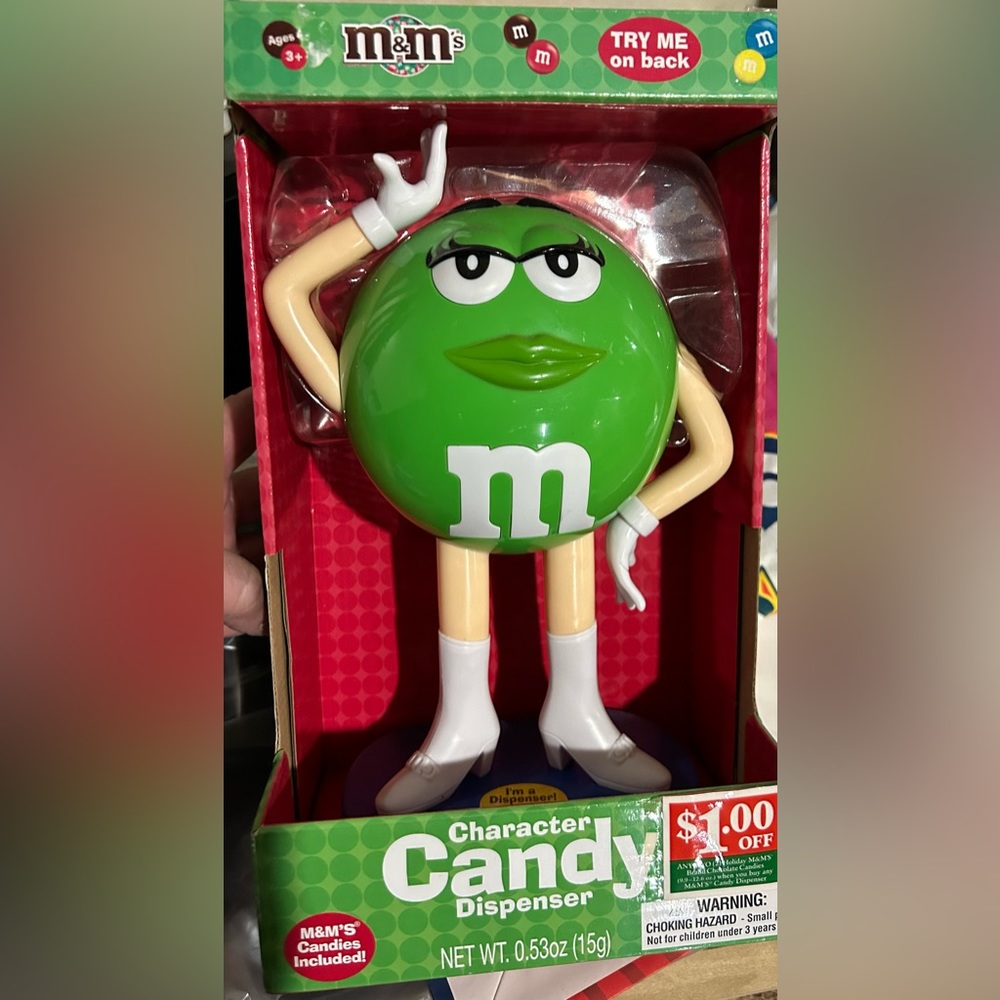 M&M Green Candy Dispenser.  New in box. No longer making this character anymore.